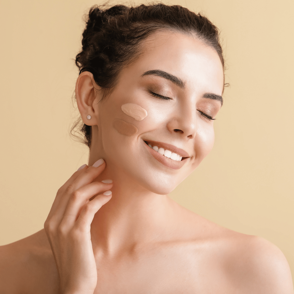 Model applying Karin Herzog BB Cream swatches on cheek for perfect shade match